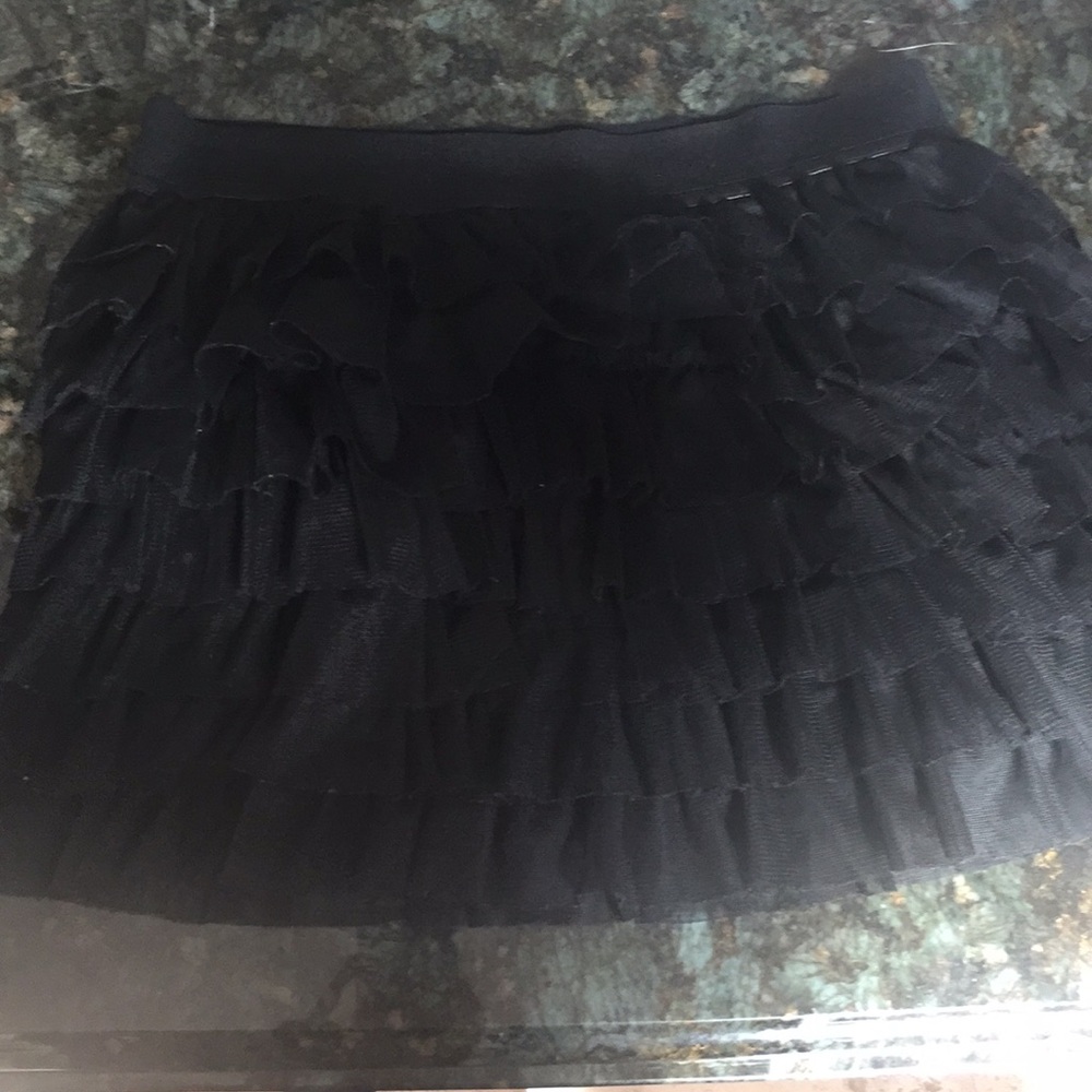 Large black frilly skirt